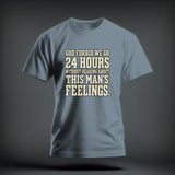 A grey crewneck t-shirt featuring the printed text God forbid we go 24 hours without hearing about this man's feelings.