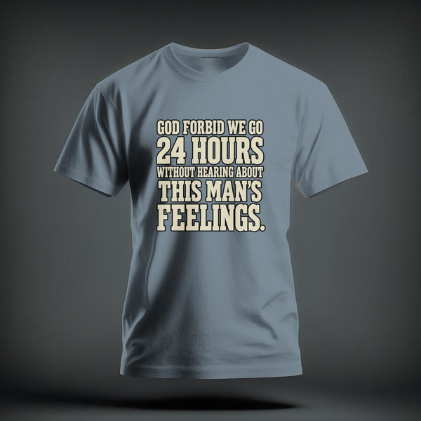 A grey crewneck t-shirt featuring the printed text God forbid we go 24 hours without hearing about this man's feelings.