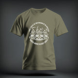An olive green t-shirt featuring a white graphic of the Four Horsemen riding golf carts, surrounded by circular text.