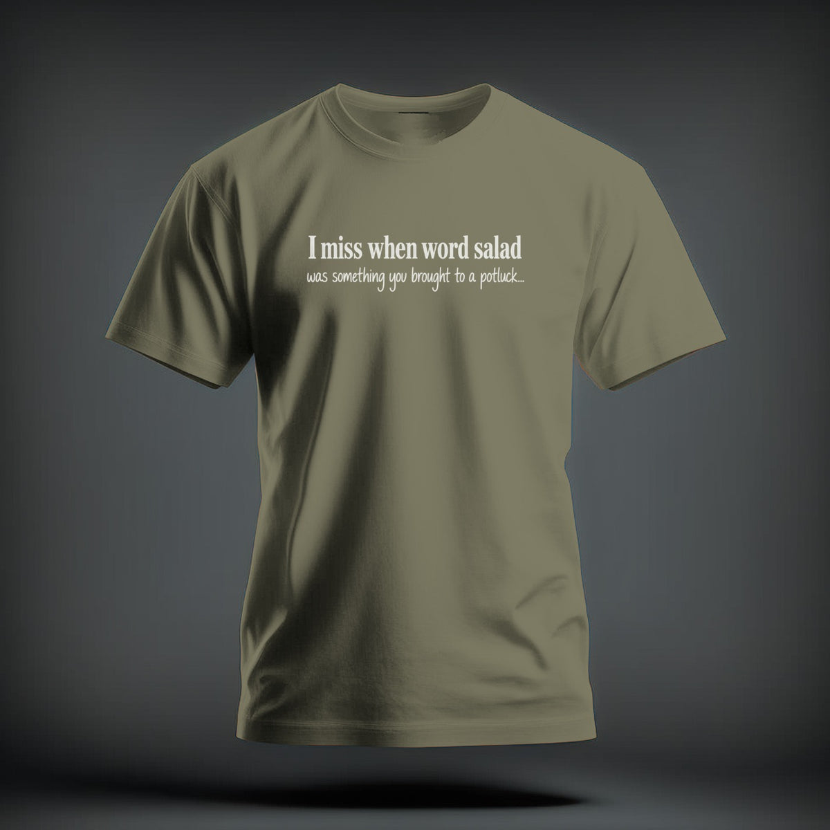 Olive green t-shirt with white text reading "I miss when word salad was something you brought to a potluck...".