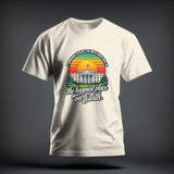 Off-white t-shirt featuring a retro graphic of the White House with sunset stripes and political satirical text.