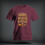 Maroon t-shirt featuring gold graphic text that reads Give Him a Nobel a Pulitzer and a Participation Trophy so We Can All Go Home.