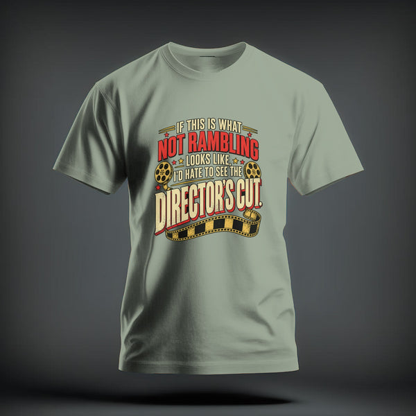 Sage green t-shirt featuring distressed red and yellow text reading If This Is What Not Rambling Looks Like, I'd Hate To See The Director's Cut with film reels and strip.