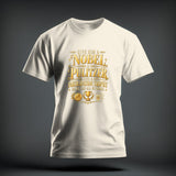 A cream-colored t-shirt with gold graphic text reading 