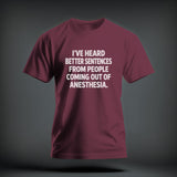 Maroon crewneck t-shirt featuring the white text I'VE HEARD BETTER SENTENCES FROM PEOPLE COMING OUT OF ANESTHESIA.