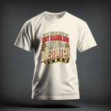 A cream-colored t-shirt with red, black, and yellow text reading 